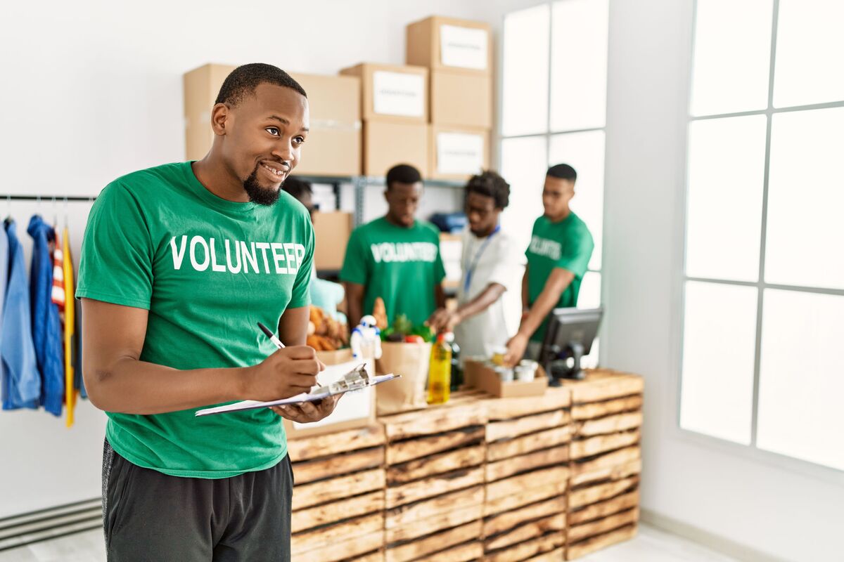 Volunteers organizing donations at a community center